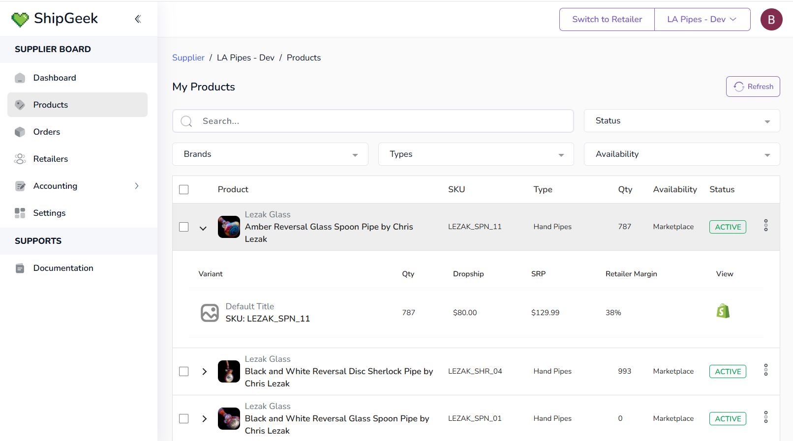 Expanded product row showing a variant table with Qty, Dropship price, SRP, Retailer Margin, and a View column