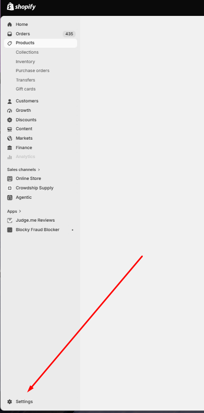 Shopify admin sidebar with an arrow pointing to Settings at the bottom